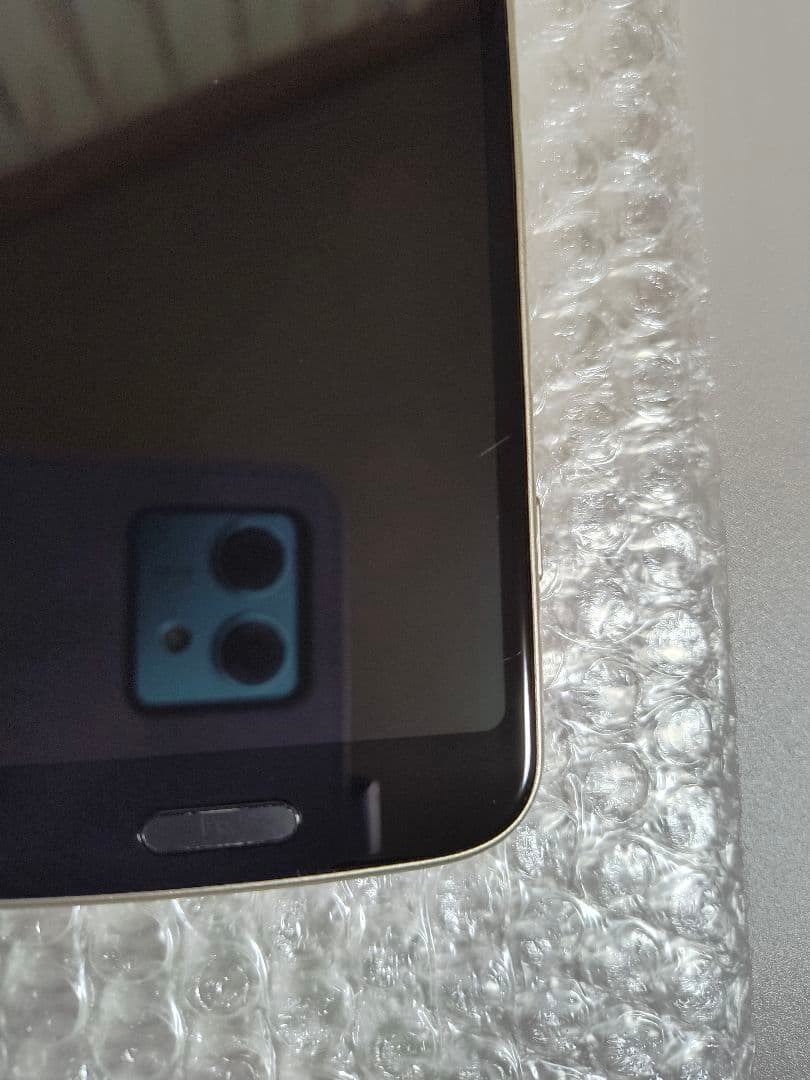 らくらくスマートフォン F-53E ゴールド 新品ケース、フィルム付き