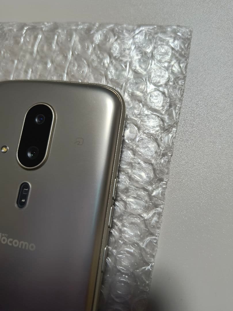 らくらくスマートフォン F-53E ゴールド 新品ケース、フィルム付き