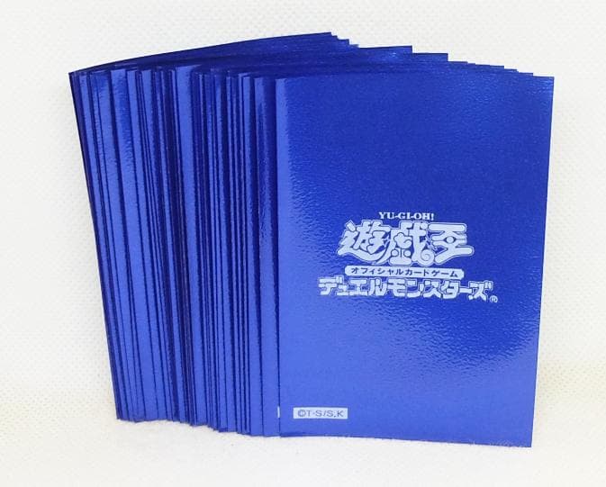 遊戯王 未使用50枚 初期ロゴ メタリックブルー スリーブ