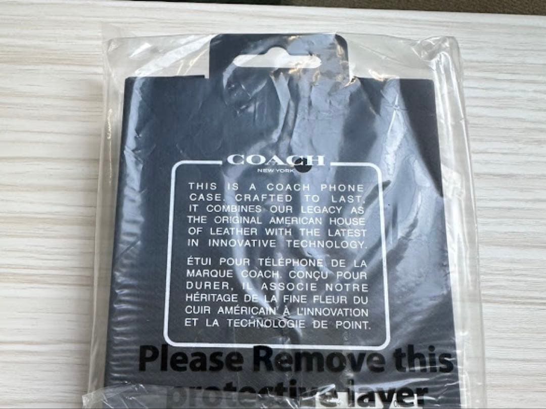 COACH iPhone15Proケース シグネチャー