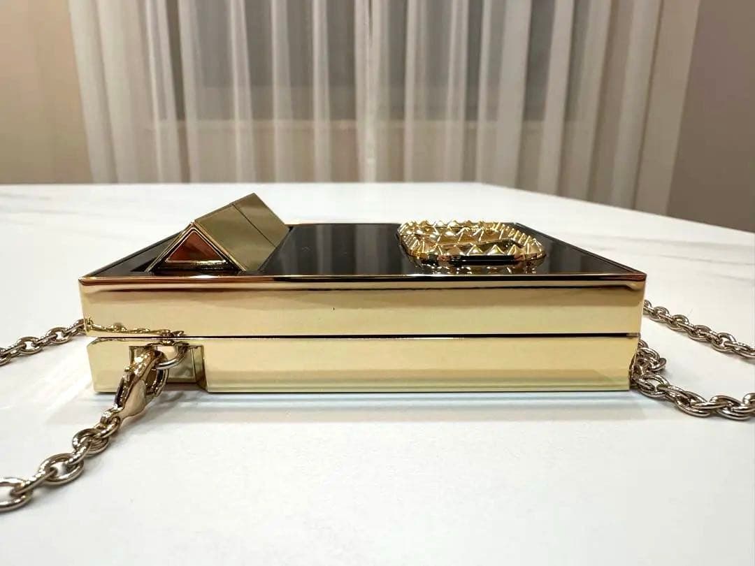 新品 VALENTINO GOクラッチ ＆ 口紅(ミニロッソ）
