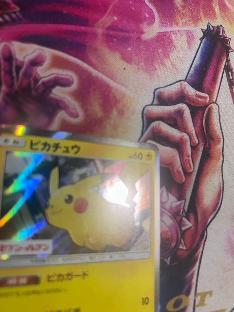 ポケモン　ポケカ　ピカチュウ　サン＆ムーン　242/SM-P プロモ　セブン