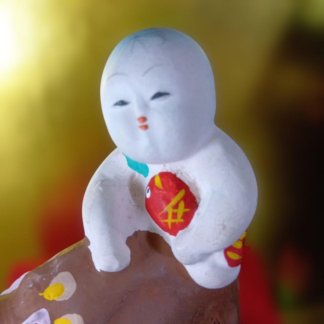 子供とイノシシの陶器置物