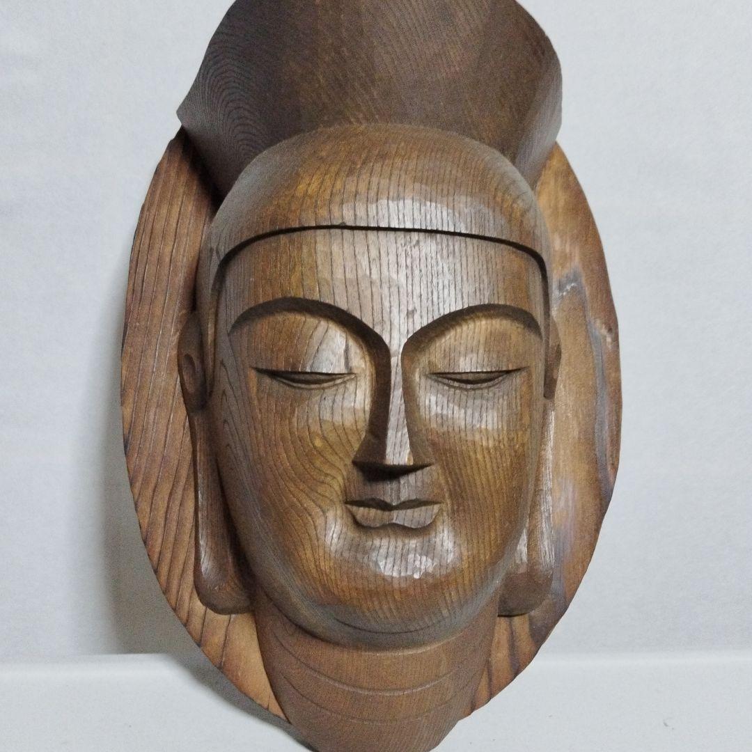 一刀彫のお面です。