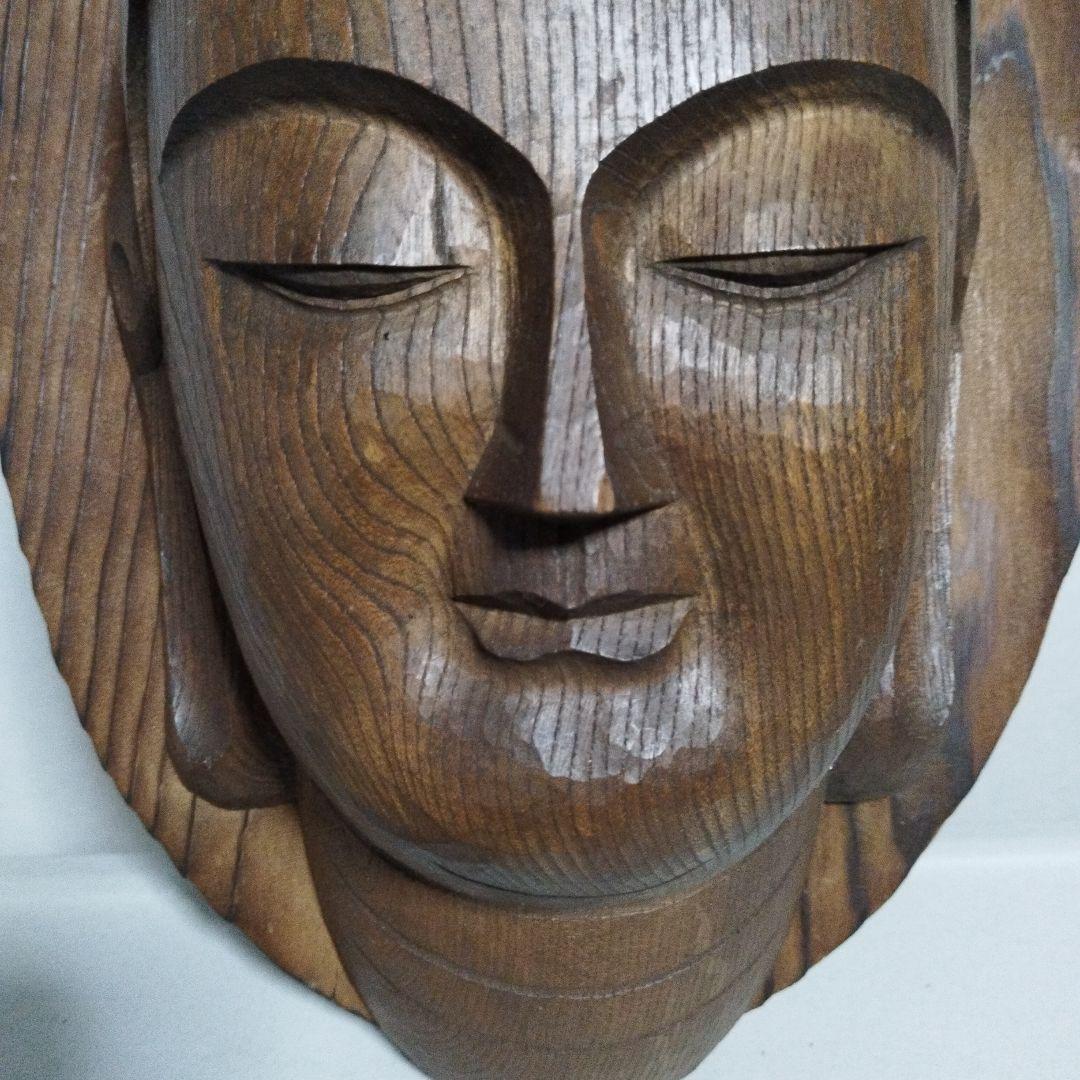 一刀彫のお面です。