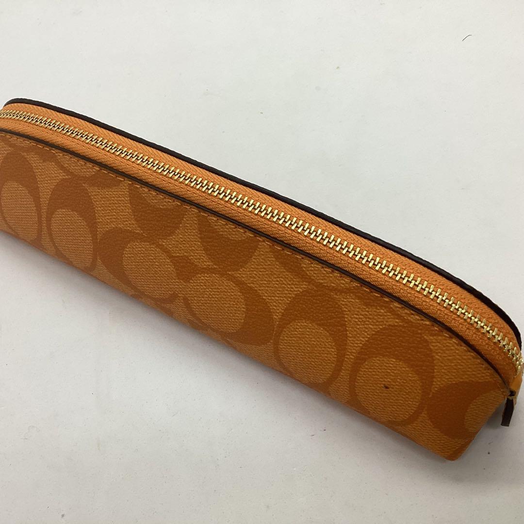 セール　COACH オレンジ系　小物入れ，ペンケース