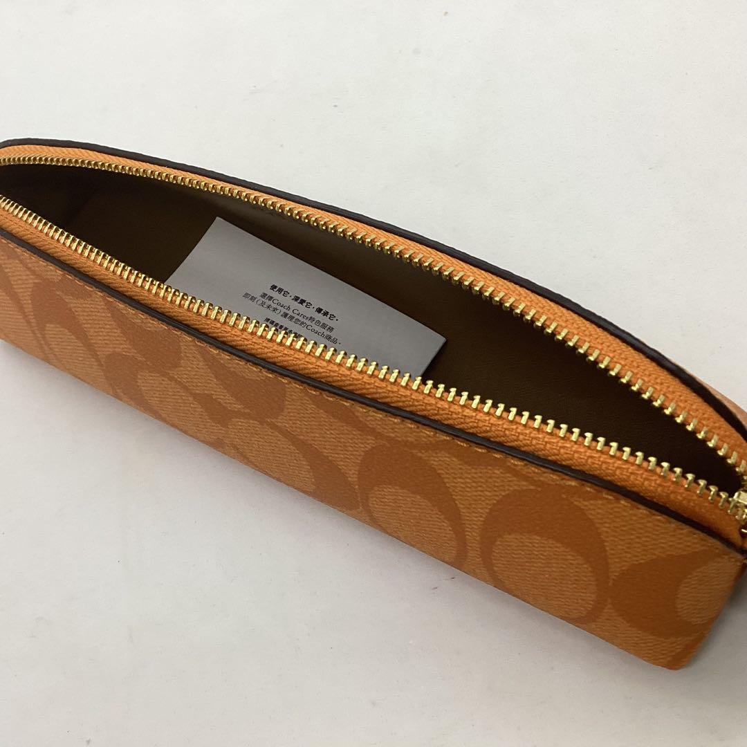 セール　COACH オレンジ系　小物入れ，ペンケース