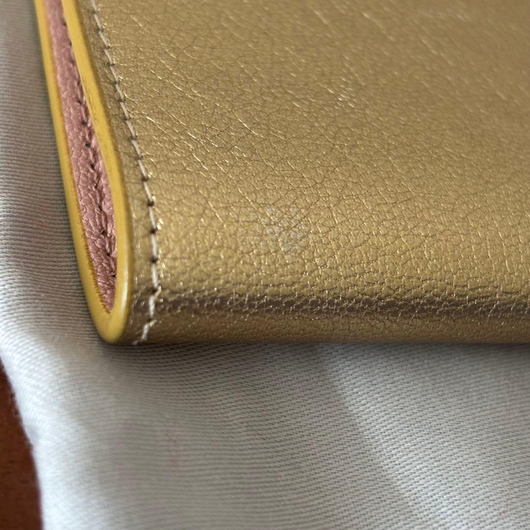 ■ 美品 ■ EMILIO PUCCI ゴールド レザーパスポートケース リボン