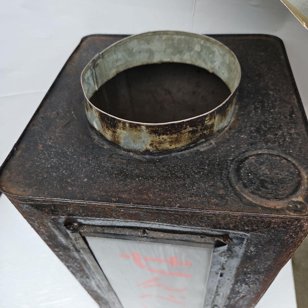 せんべい容器 黒と赤の金属製